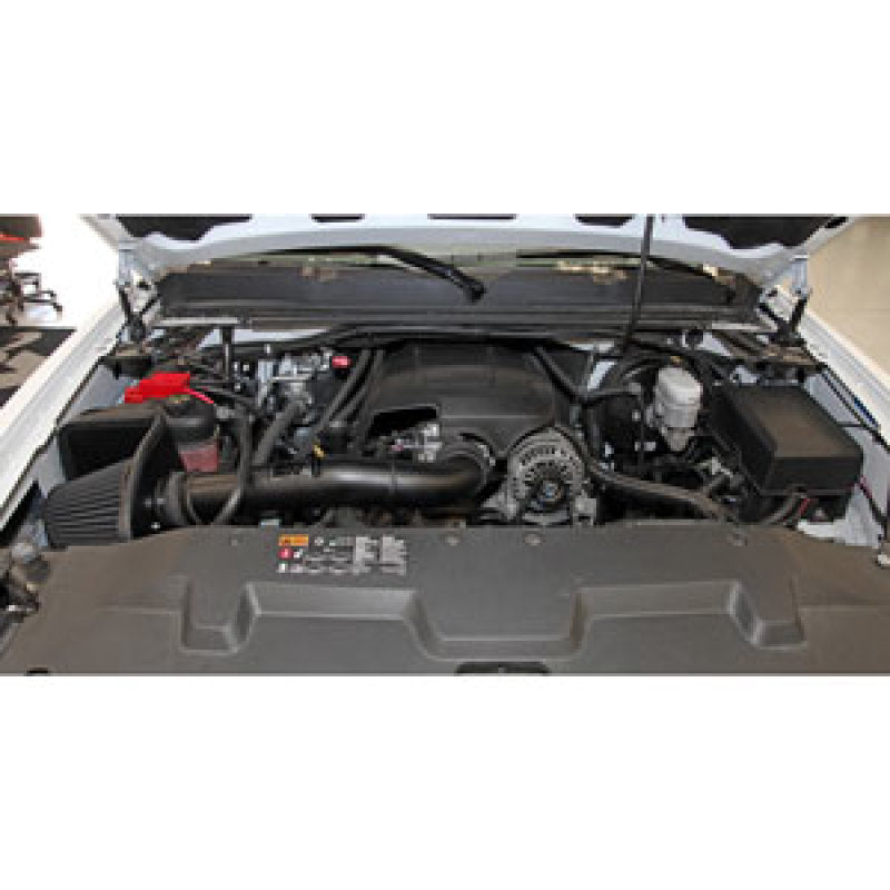 K&N black performance cold air intake kit installed in 2009-2013 Chevy Silverado 1500, Avalanche, Suburban, GMC Yukon.