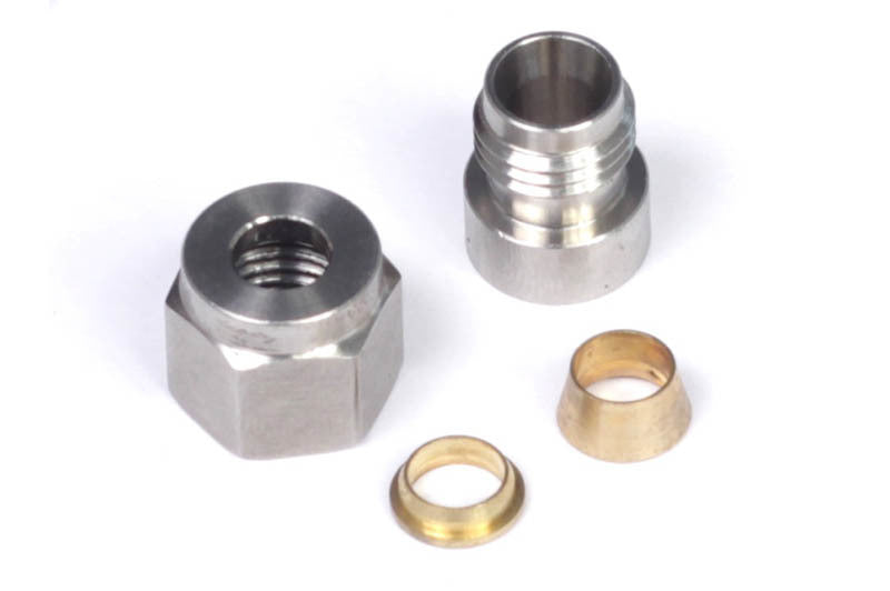 Haltech 1/4-inch stainless steel weld-on fitting kit with nut and ferrule, showing assembled fittings and welding components.