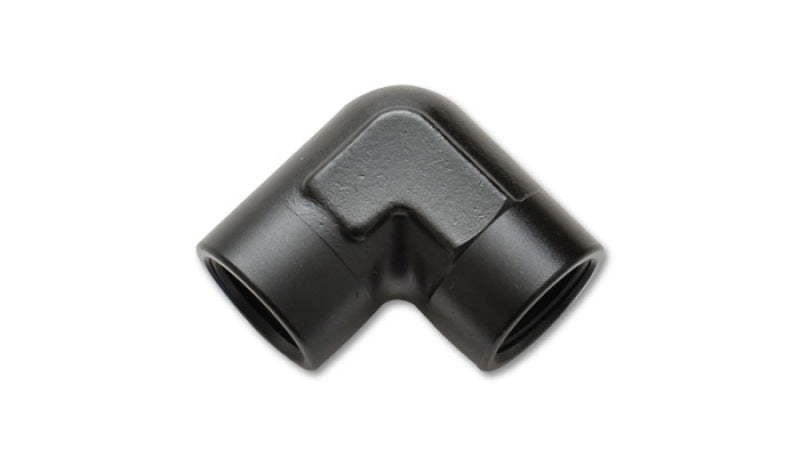 Vibrant 3/8-inch NPT female pipe coupler fitting showing a bright metal finish and threaded ends for plumbing connections.
