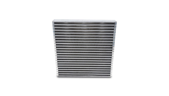 Vibrant universal oil cooler core measuring 12x12x2 inches, with metal fins and inlet/outlet fittings for automotive cooling system