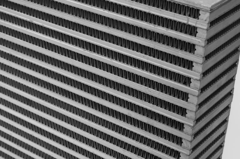 CSF high performance bar and plate intercooler core showing 22-inch length, 12-inch height, and 3.5-inch width with fin design.