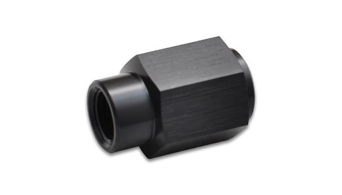 Vibrant LS engine fuel pressure adapter fitting showing metal construction and threaded ends for secure connection.