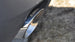 Polished CORSA Performance catback exhaust for Chevrolet Camaro SS 2011-2015 with 6.2L V8, showing the stainless steel pipes and muffler