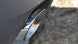 Polished CORSA Performance catback exhaust for Chevrolet Camaro SS 2011-2015 with 6.2L V8, showing the stainless steel pipes and muffler