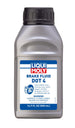 LIQUI MOLY 500mL brake fluid DOT 4 container, close-up of the automotive brake fluid bottle with label details.