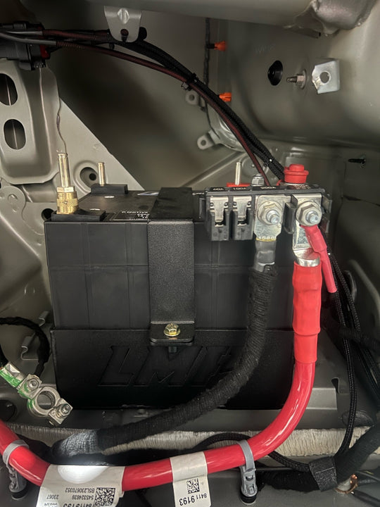 P.Motive 2K 13V car battery for ZL1 and ZO6 street cars, showing the battery with brand label and terminal connections.