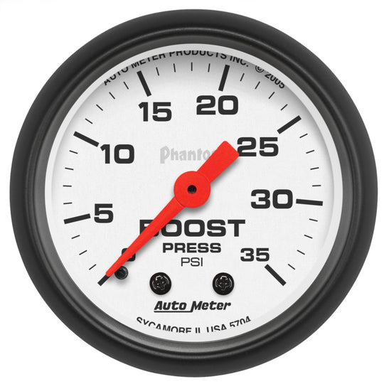 AutoMeter Phantom 52mm mechanical boost gauge displaying 35 PSI for accurate pressure measurement in automotive applications.