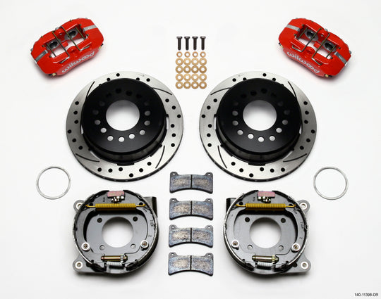 Wilwood Dynapro low-profile 11-inch P-brake kit with red calipers, for Chevy 12 bolt axle, includes drill, C-clips, and mounting hardware.