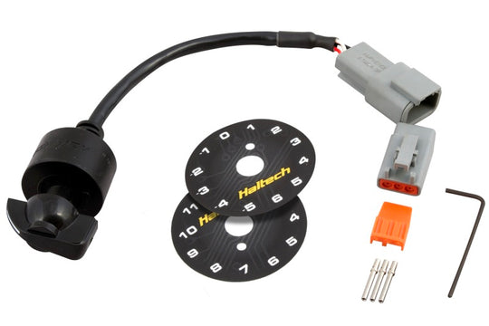 Haltech 12 Position Rotary Trim Module programmer accessory with dials and connection ports for vehicle tuning.