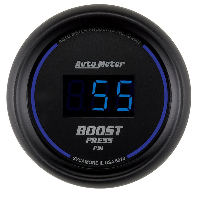 AutoMeter Cobalt Digital 52mm boost gauge displaying digital PSI readings for car performance monitoring.