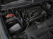 aFe Magnum FORCE Stage-2 Pro Dry S cold air intake system installed in a 2009-2014 Chevrolet Silverado or GMC Yukon.