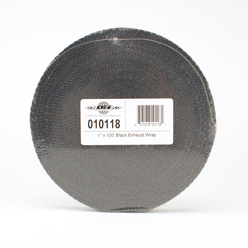 Black DEI Exhaust Wrap 1in x 100ft wrapped around a car exhaust pipe, designed to insulate and protect engine components.