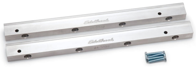 Edelbrock Ford 4.6L SOHC fuel rail for Victor Jr EFI manifold, made of metal with mounting brackets and fuel inlet ports.
