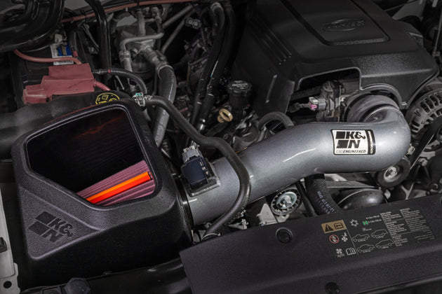 K&N Engineering Silverado 1500 NextGen aluminum cold air intake system installed in a pickup truck engine bay