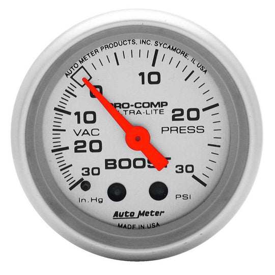 AutoMeter Ultra-Lite 52mm 30 PSI mechanical boost gauge showing black dial with white markings and needle for car engine boost monitoring.