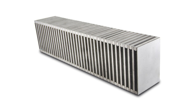 Vibrant vertical flow intercooler core with 24-inch width, 6-inch height, and 4.5-inch thickness, featuring vibrant cooling fins.
