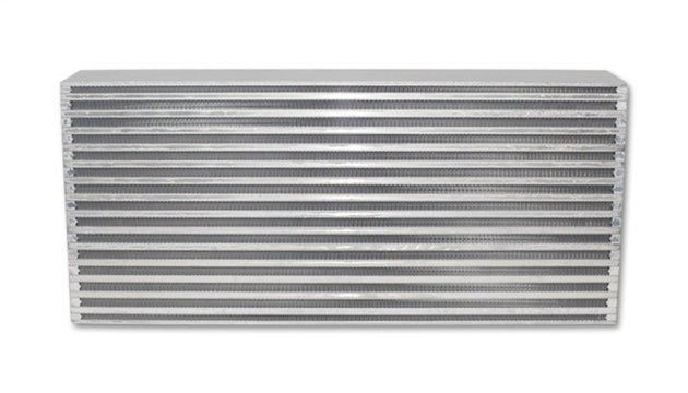 Vibrant intercooler core measuring 22x9.85x4 inches with vibrant fin design for automotive cooling systems.
