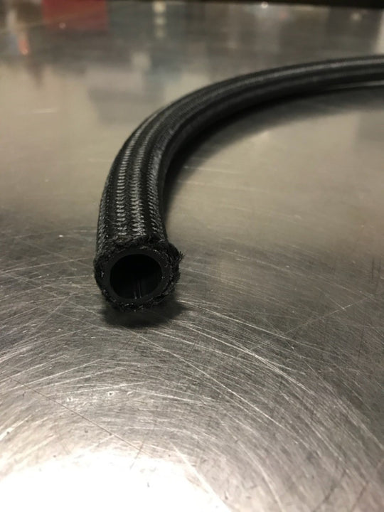 Fragola -12AN premium nylon race hose, 6 feet long, with black and red flexible hose shown on a white background.