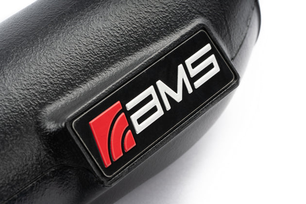 AMS Performance turbo inlet tubes for 2021+ Ford Raptor and F-150 3.5L EcoBoost engines, shown installed on the engine bay.