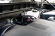 CORSA Performance aluminum oil catch can installed in a Silverado/Sierra or Tahoe/Suburban/Yukon vehicle engine bay.