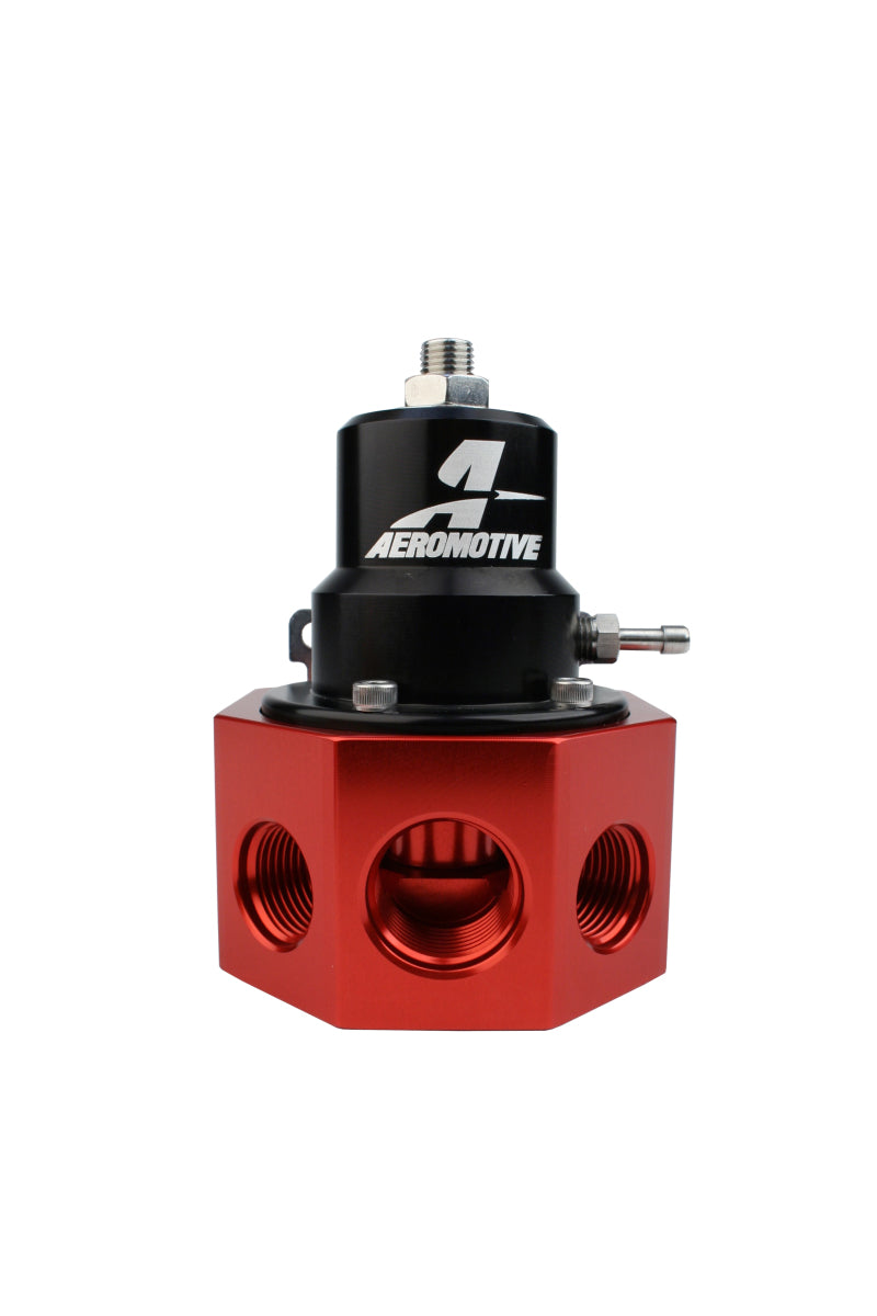 Aeromotive A2000 carbureted bypass fuel pressure regulator with 4 ports, black metal body, and connection fittings for engine fuel system.