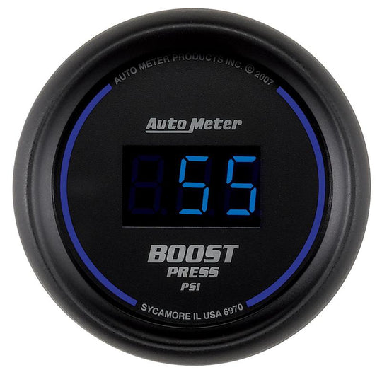 AutoMeter Cobalt Digital 52mm boost gauge displaying PSI readings on a sleek black dial with digital readout.