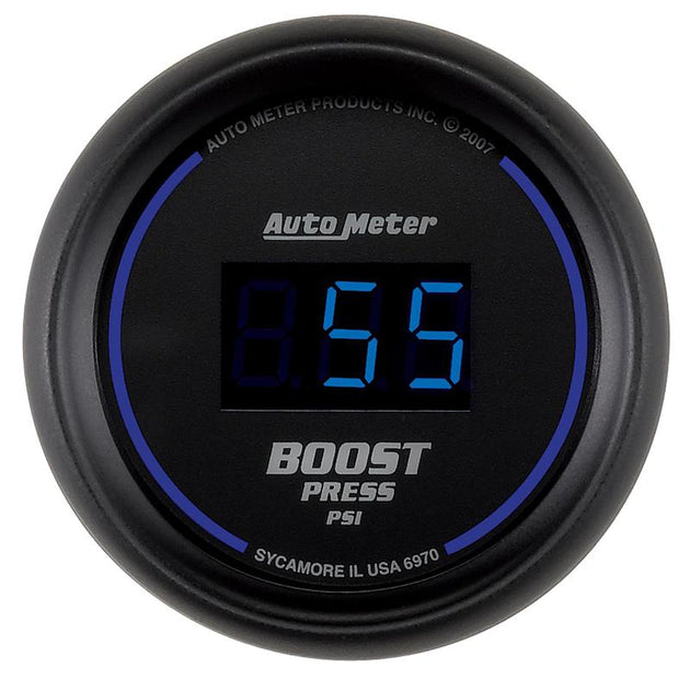 AutoMeter Cobalt Digital 52mm boost gauge displaying PSI readings on a sleek black dial with digital readout.