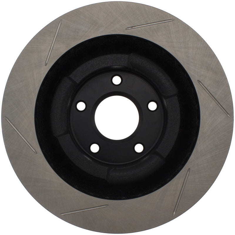 StopTech Power Slot front left slotted brake rotor for Chevrolet Corvette 2006-2010, showing detailed slotted surface and vented design.