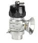 Black Turbosmart Supersonic Uni Blow Off Valve installed on a turbocharged engine, showcasing its sleek design and branding.