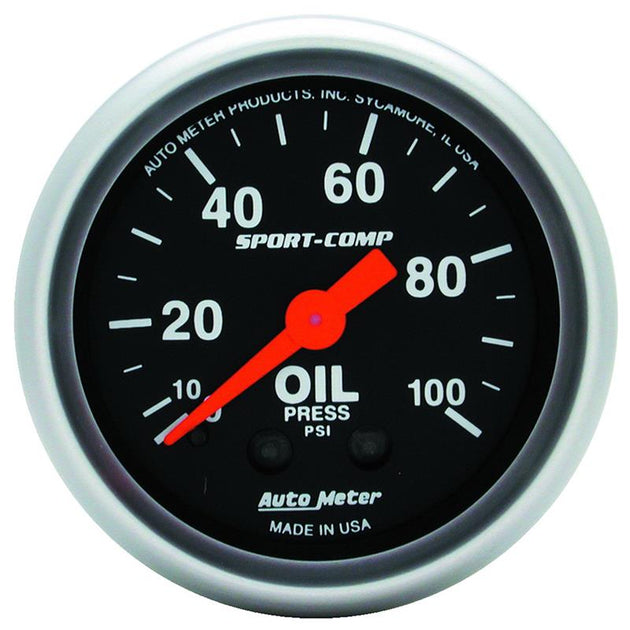 AutoMeter Sport Comp 52mm mechanical oil pressure gauge showing 0-100 PSI with black dial and silver bezel.