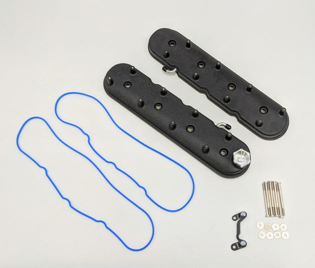 Pair of black wrinkle finish Granatelli GM LS standard height valve covers with angled coil mounts, designed for V8 engines.