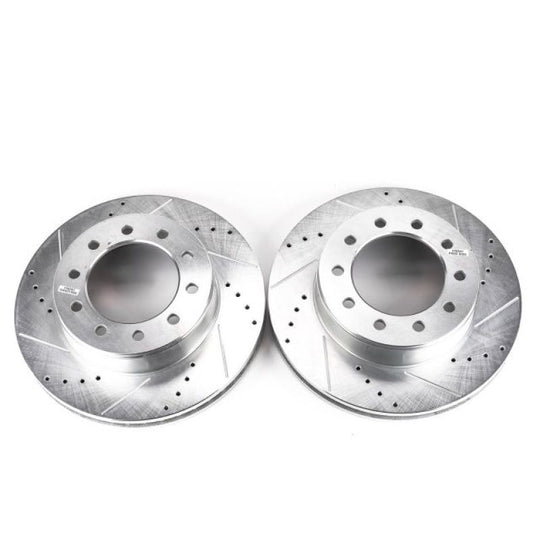Pair of PowerStop front drilled and slotted brake rotors for Ford F-550 Super Duty trucks, enhanced braking performance.