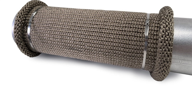 DEI Titanium 4-inch knit exhaust sleeve wrapped around car exhaust pipe, 12 inches long, showcasing high-temperature heat wrap.