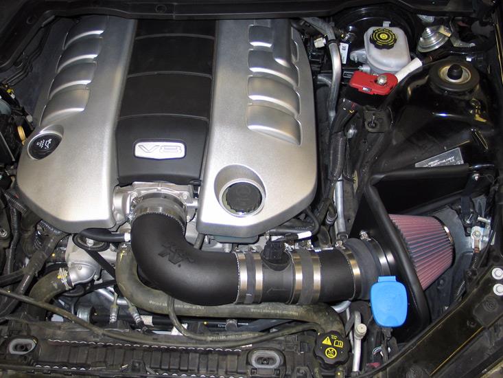 K&N Engineering cold air intake for Pontiac G8 V8-6.0L engine, showing the high-performance intake tube and filter system.