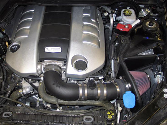 K&N Engineering cold air intake for Pontiac G8 V8-6.0L engine, showing the high-performance intake tube and filter system.
