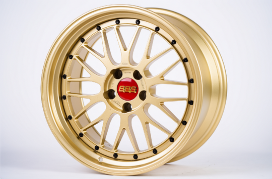 BBS LM 19x10 forged gold wheel with 5x114.3 bolt pattern and ET22 offset, F1 Championship Edition, close-up view of wheel face