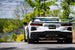 MBRP catback exhaust system for Chevrolet Corvette C8 20-24 with quad split rear exit and AFM sims visible in the image.
