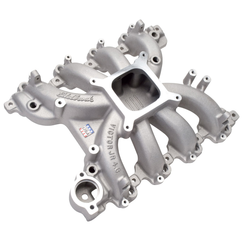 Edelbrock Victor Jr Ford EFI intake manifold for 4.6L engines, performance aluminum manifold with detailed carburetor mounting surface.