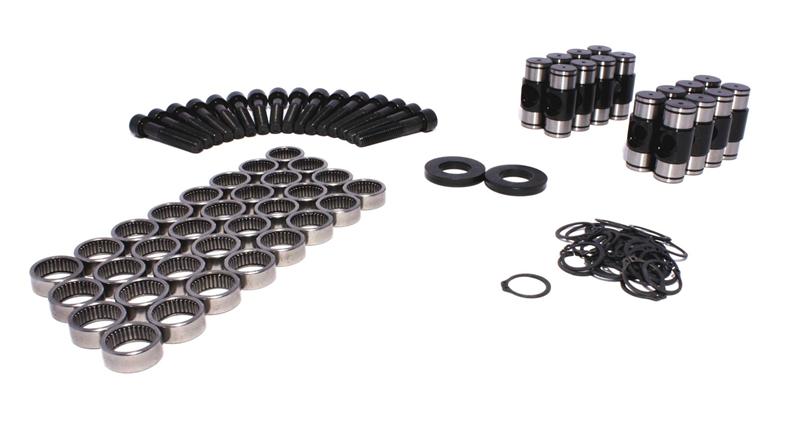 COMP Cams LS-type rocker arm trunnion kit for engine retrofit, showing detailed metal components and assembly parts.