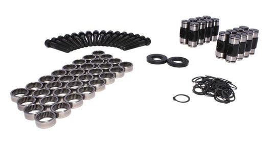 COMP Cams LS-type rocker arm trunnion kit for engine retrofit, showing detailed metal components and assembly parts.