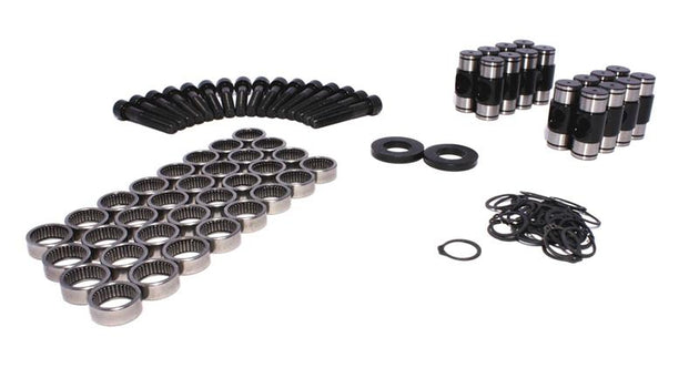 COMP Cams LS-type rocker arm trunnion kit for engine retrofit, showing detailed metal components and assembly parts.