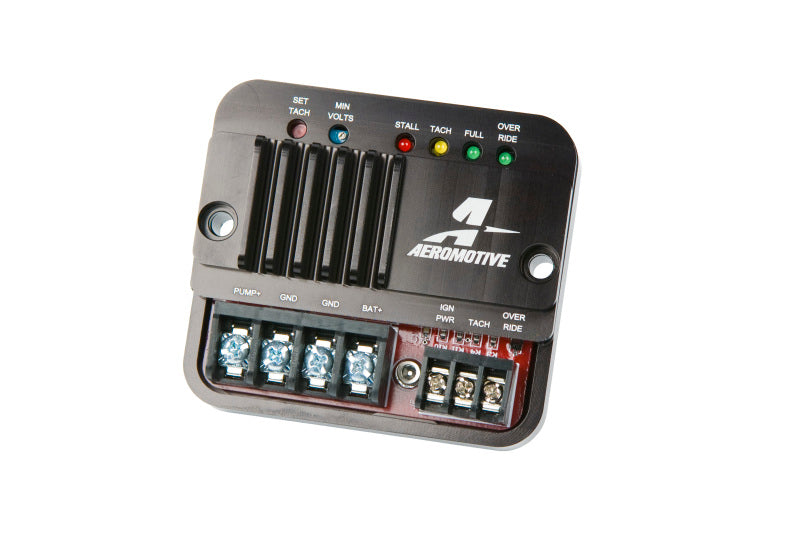 Aeromotive Fuel Pump Speed Controller installed on a vehicle, showcasing the compact black electronic device for precise fuel pump control.