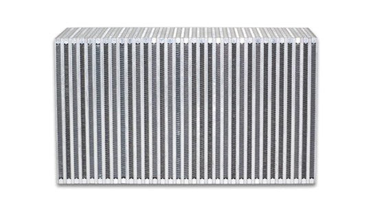 Vibrant vertical flow intercooler core with 18-inch width, 12-inch height, and 6-inch thickness, featuring a vibrant heat exchange design.