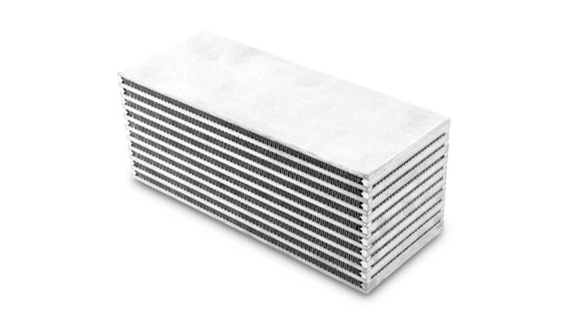 Vibrant 10-inch wide by 4-inch high water-to-air intercooler core with 4-inch thickness, designed for high-performance cooling systems