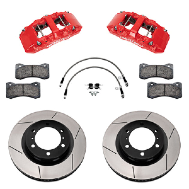 Wilwood 24-25 Toyota Tacoma front Aero6-DM big brake kit with 13.38-inch rotors, red calipers, and brake lines installed.