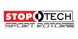 Rear left StopTech Sport slotted brake rotor showing detailed slits and metallic finish for enhanced braking performance.
