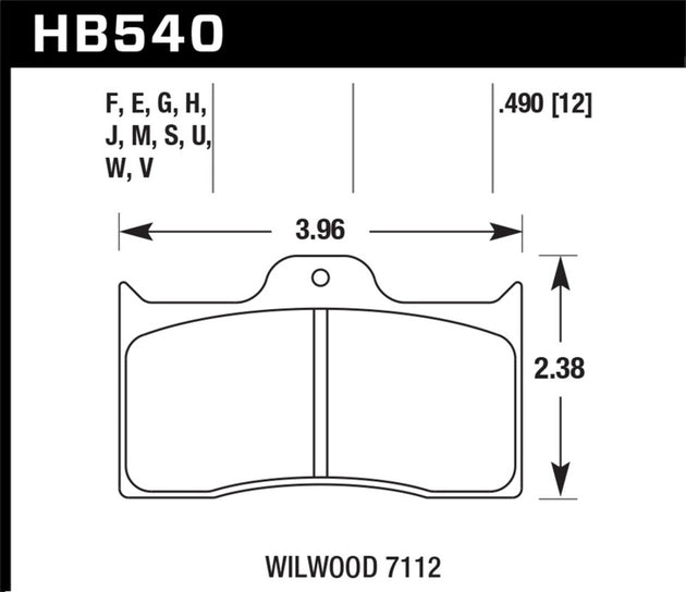 Hawk Wilwood HPS 5.0 performance brake pads installed in a vehicle, showing the brake pad design and branding.