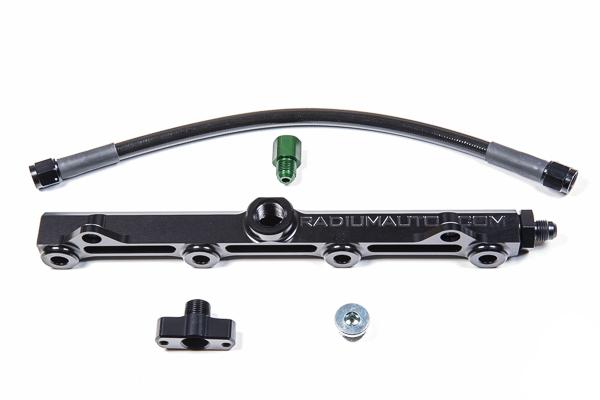 Radium Engineering GM LS engine fuel rails with polished metal finish, designed for high-performance fuel delivery systems.