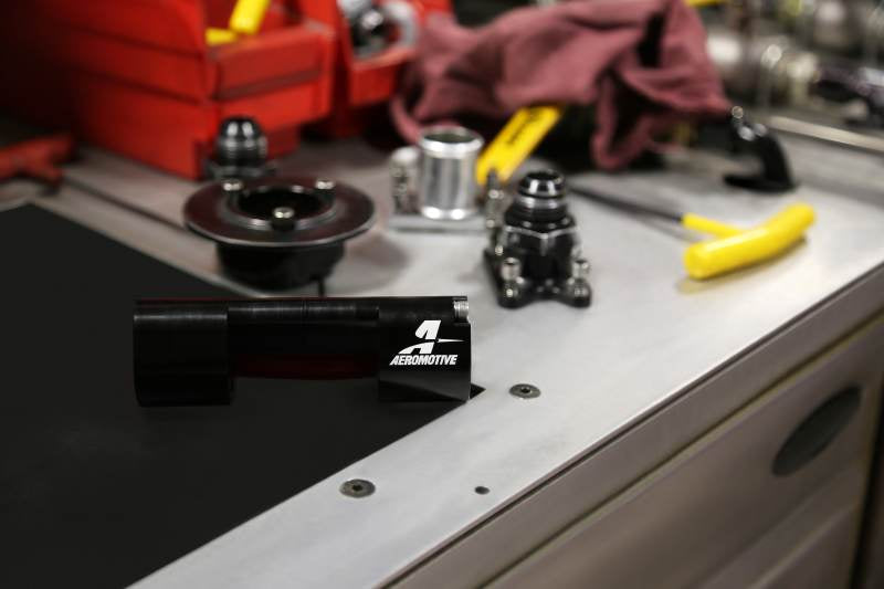 Aeromotive Flex Fuel AN-10 sensor adapter fitting with stainless steel construction and threaded connections.