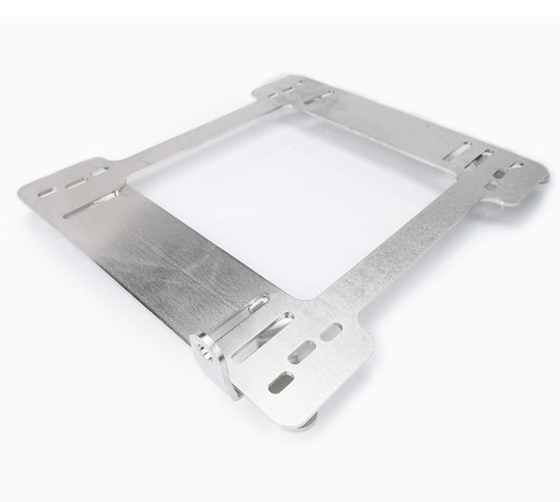 Pair of NRG seat brackets for BMW E46 99-05, sturdy metal frames designed for secure seat mounting in automotive upgrades.